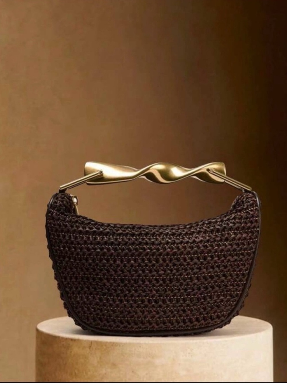 Zara Woven Crescent brown
Bag with Sculpted Gold Handle - Picture 1 of 5